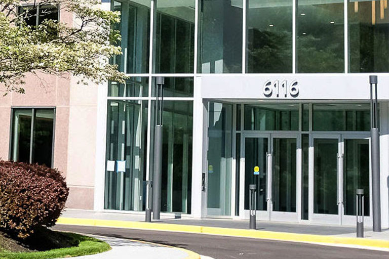 The main entrance to the office building at 6116 Executive Blvd