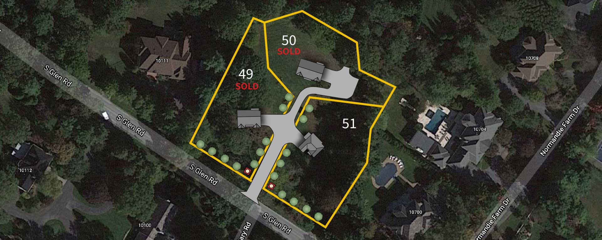 An aerial satellite image showing a three lot subdivision lot outline superimposed with proposed house placement, lots 49 and 50 marked SOLD