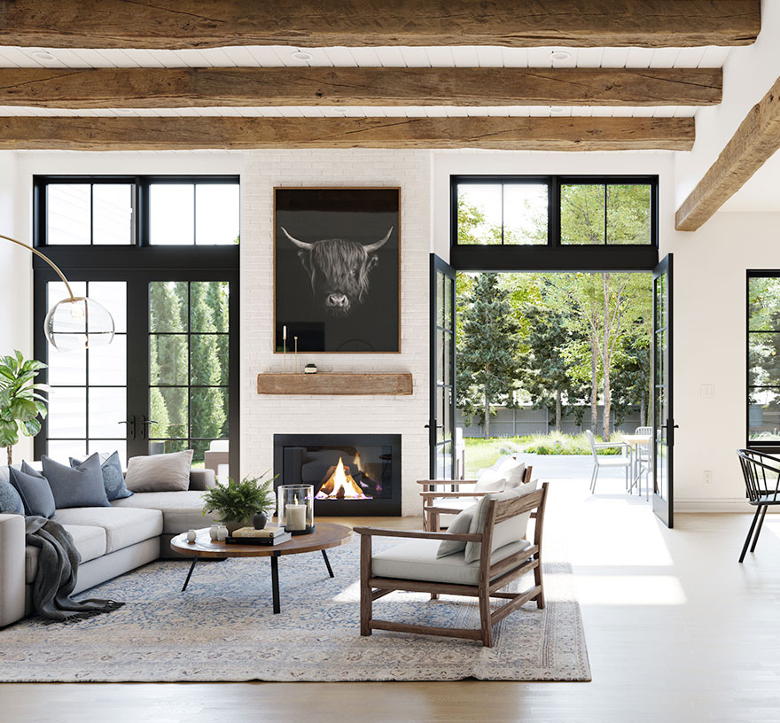 A modern farmhouse style family room with stained exposed beams, fireplace with natural wood hearth and a pair of double exterior doors.