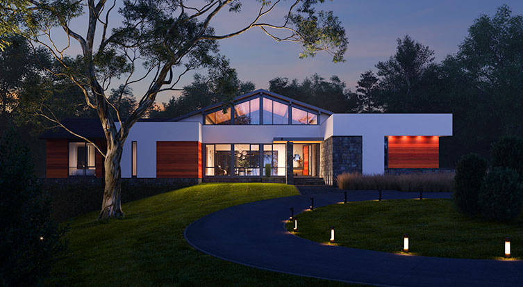 An image showing a California Modern inspired custom home illuminated in the night.