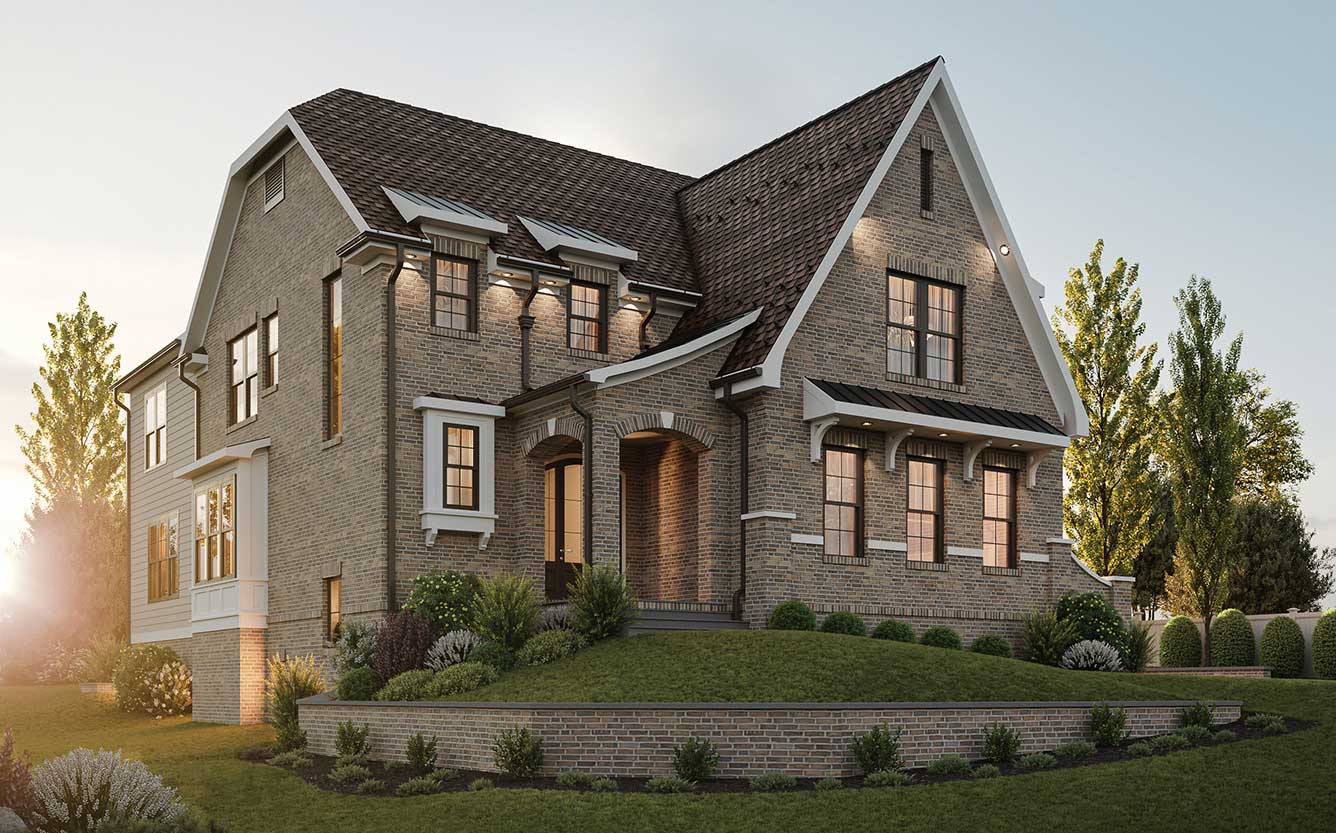 The Woodmont's English Cottage inspired front elevation featuring a unique arched brick entryway.