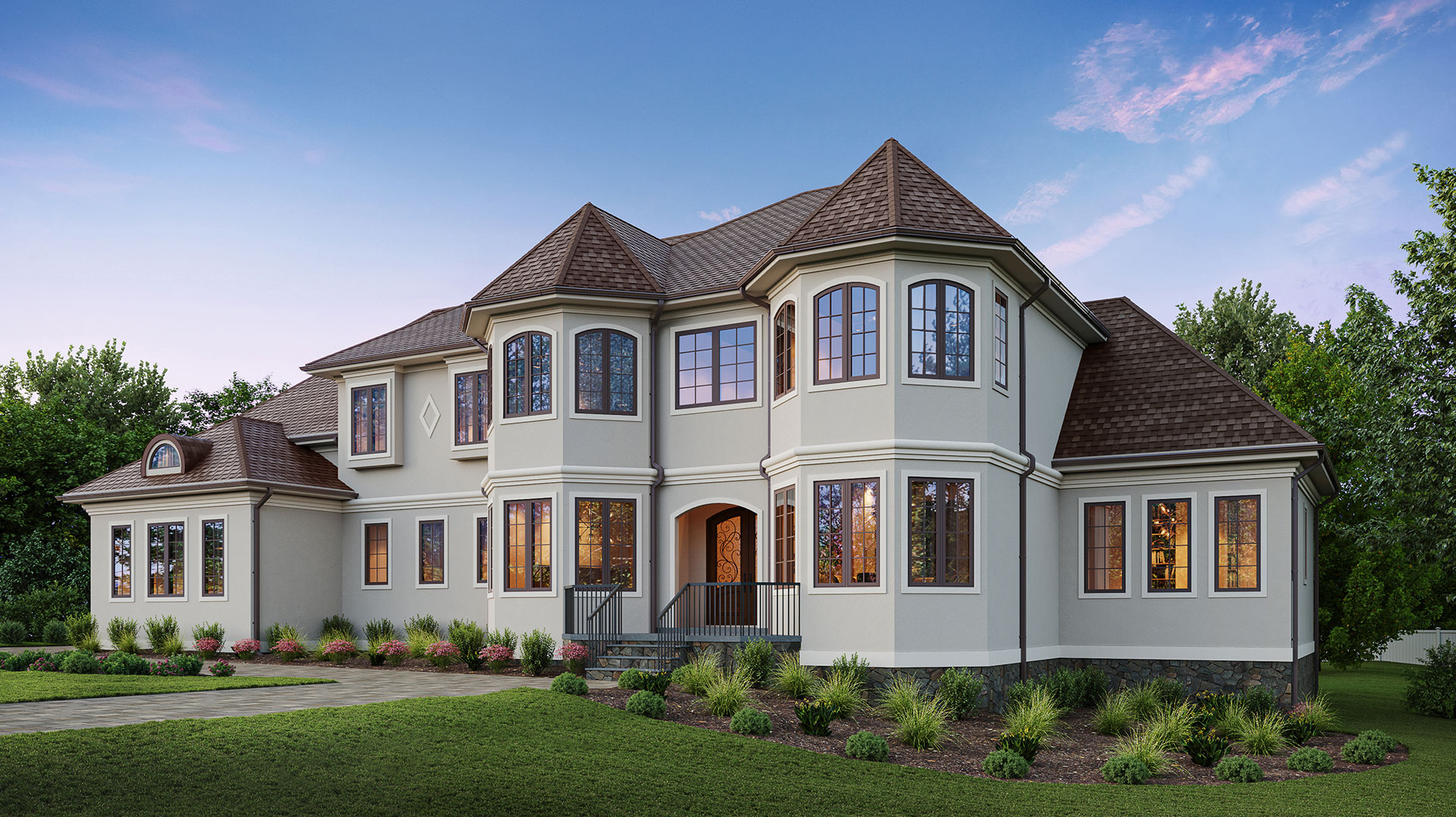 A mediterranean style front exterior in light beige stucco with brown windows and white trim.