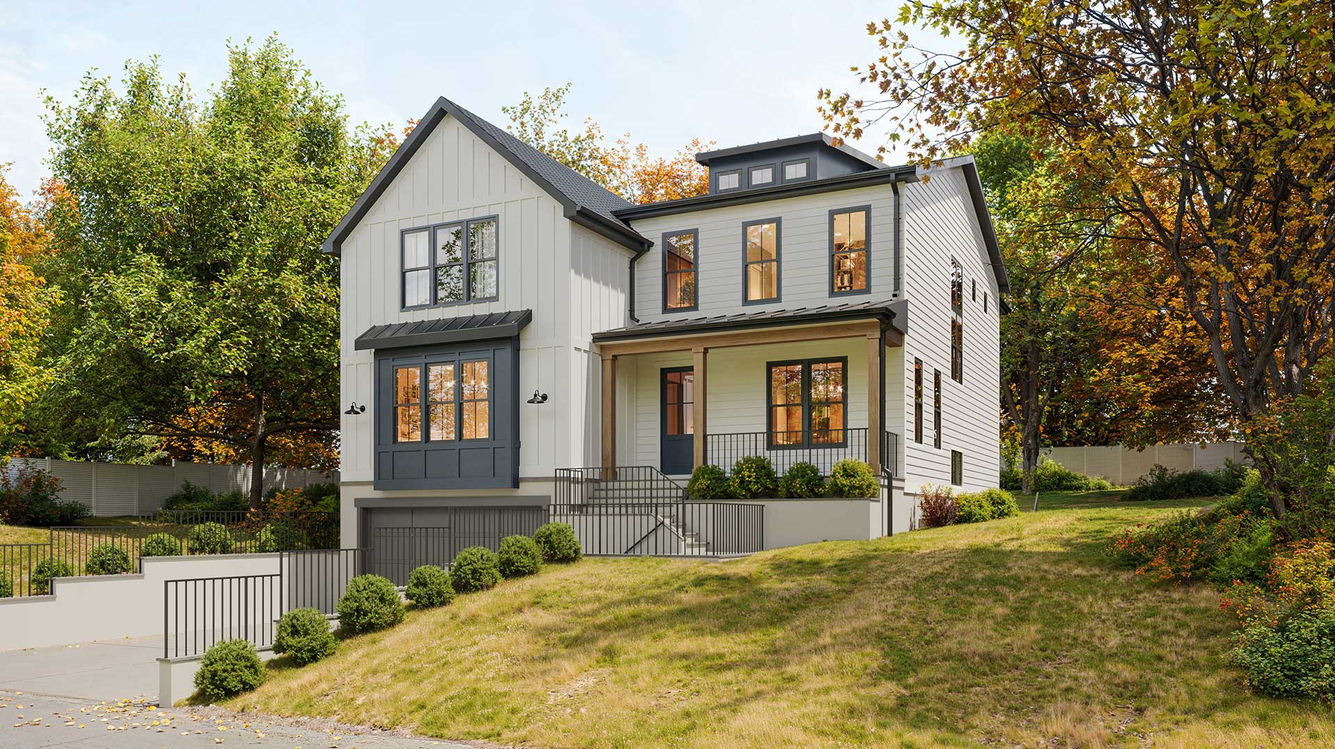 A modern farmhouse with drive under garage, white with dark windows and dark blue accents including window assembly and front door.