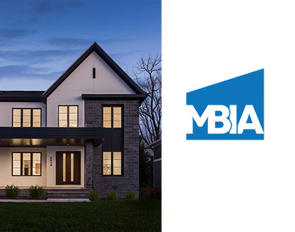 The logo for the Maryland Building Industry Association and a contemporary stucco and stone home