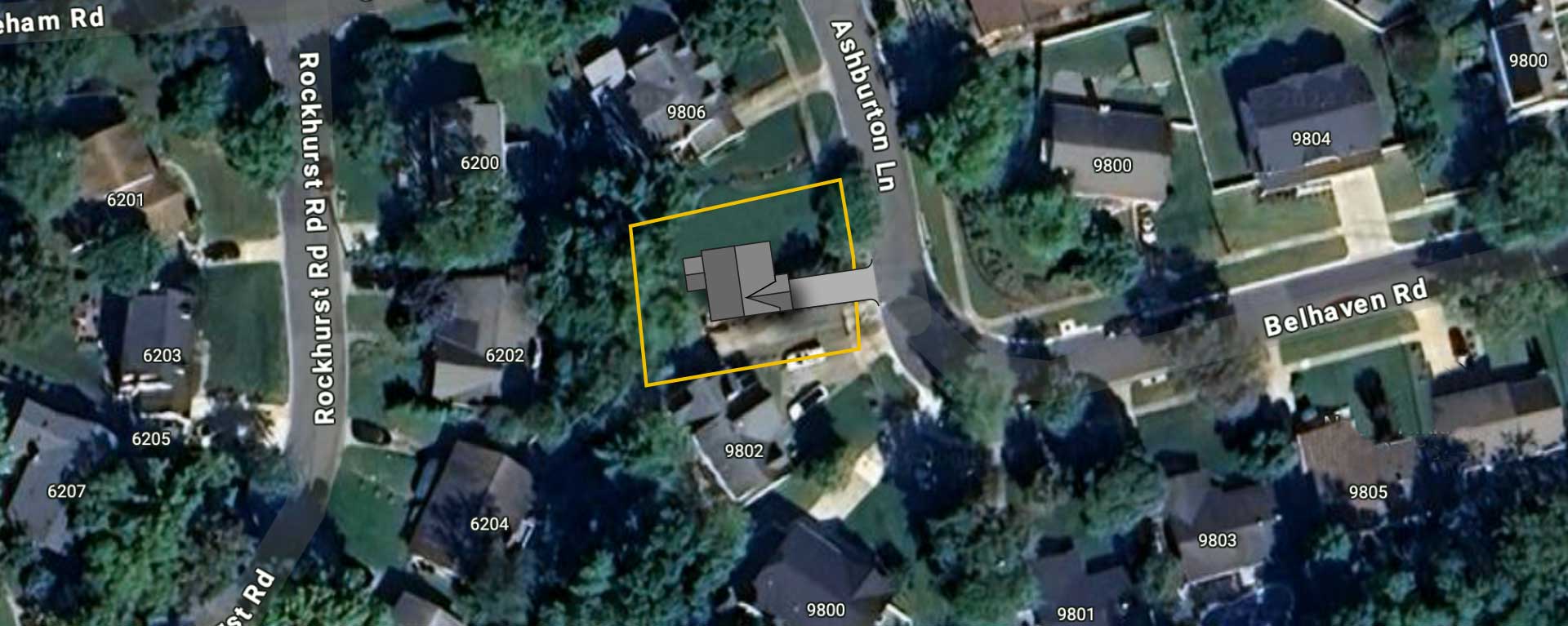 A satellite image of 9804 Ashburton Ln with site outline, house and driveway illustrations superimposed.