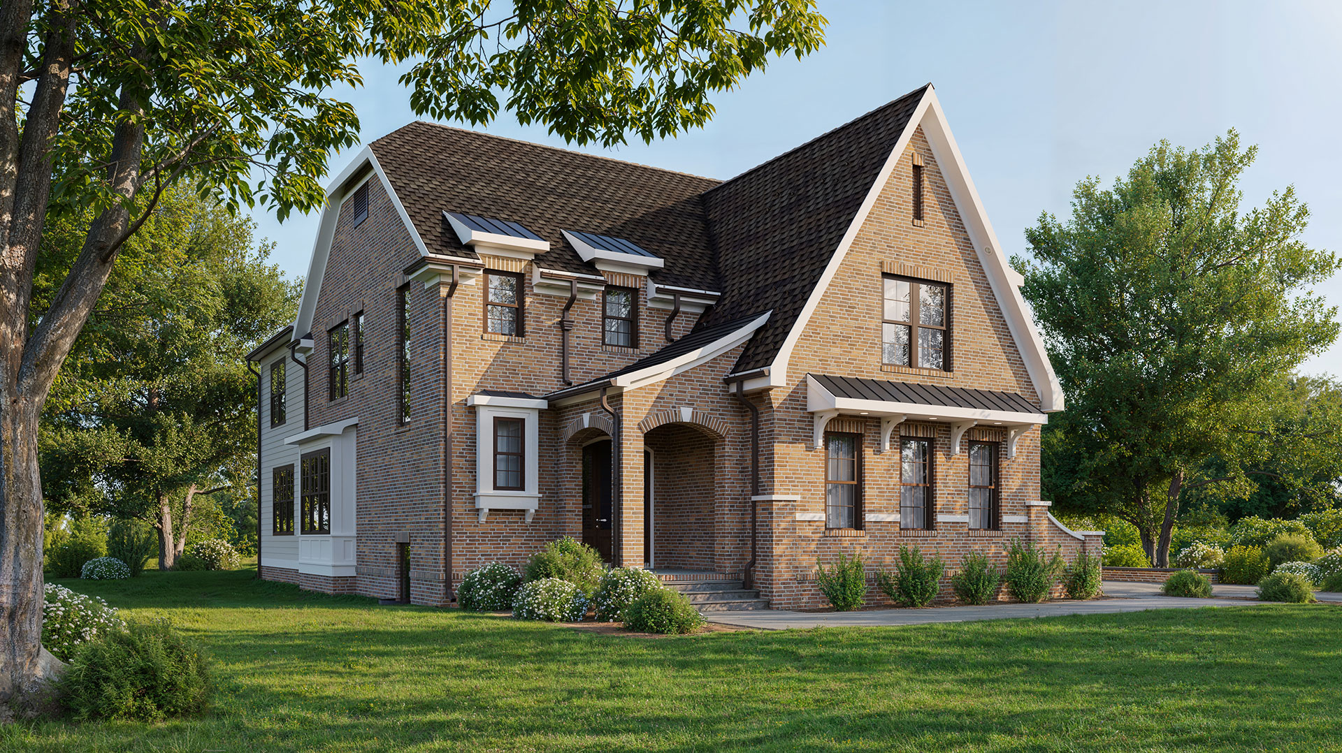 An english cottage style home in red brick on a flat landscape with a few trees, green lawn and landscaping on a sunny day, blue sky.